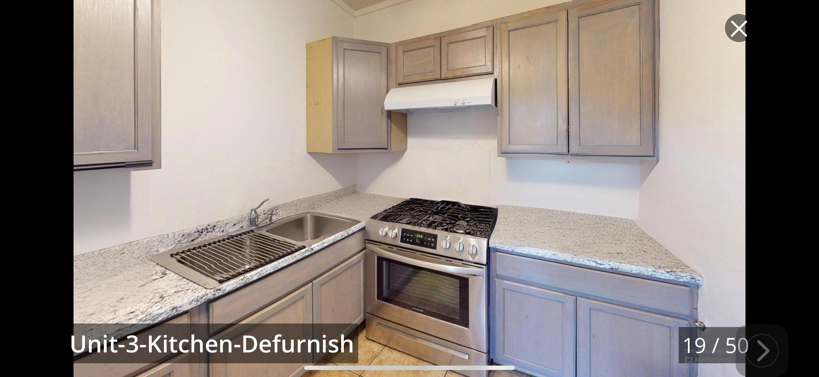 73760 Rancho Road Palm Desert, CA 92260 - Photo 11 of 27 a stove top oven sitting inside of a kitchen