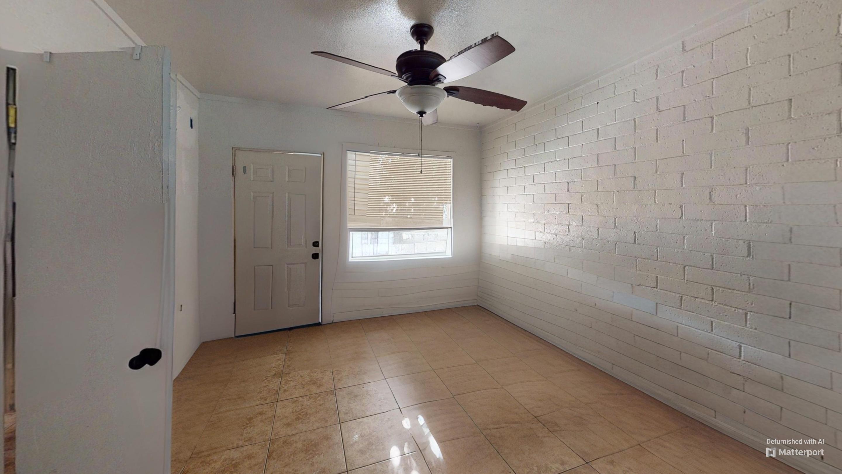 73760 Rancho Road Palm Desert, CA 92260 - Photo 14 of 27 a view of an empty room with a window