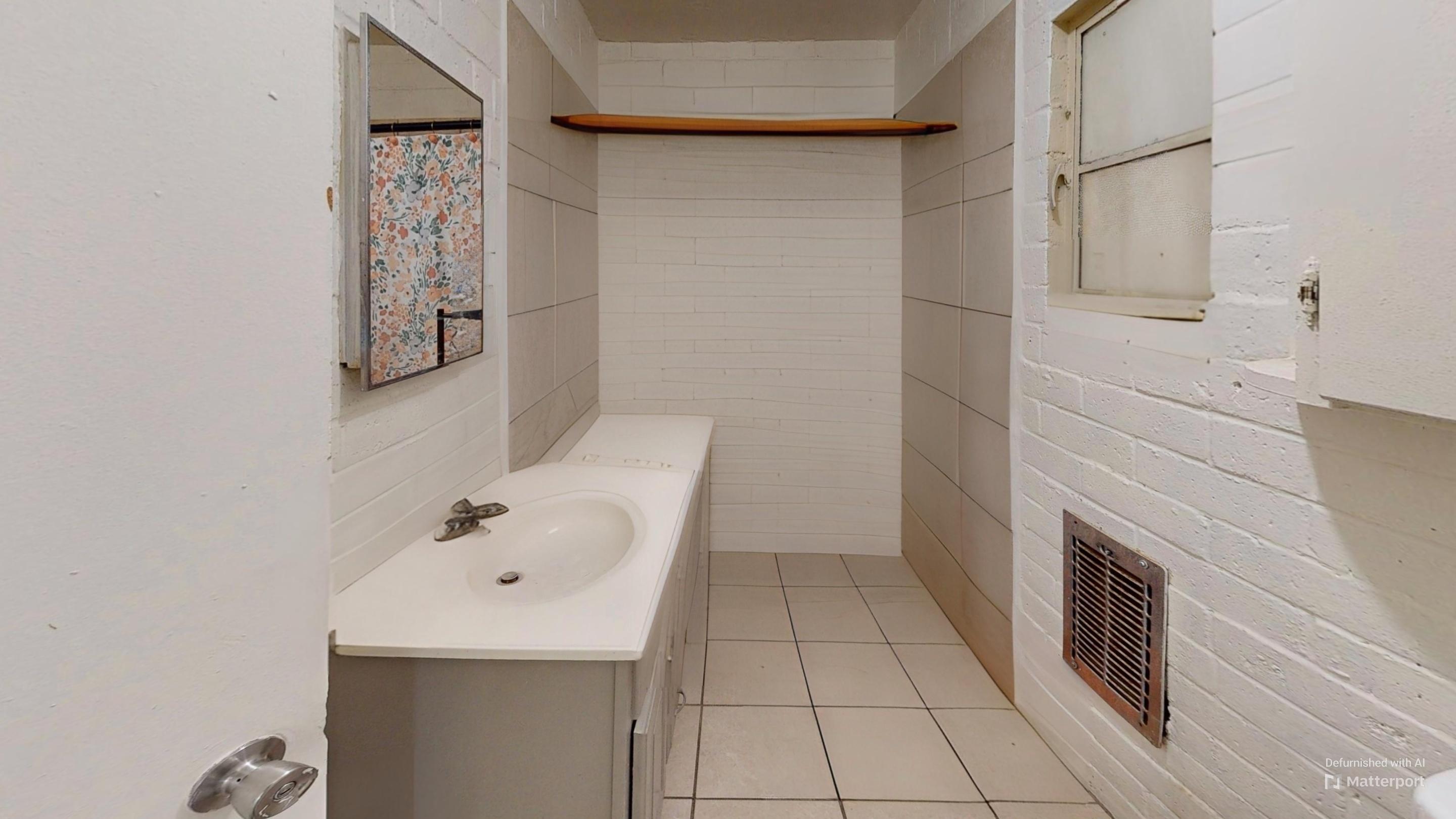 73760 Rancho Road Palm Desert, CA 92260 - Photo 19 of 27 a bathroom with a sink and mirror