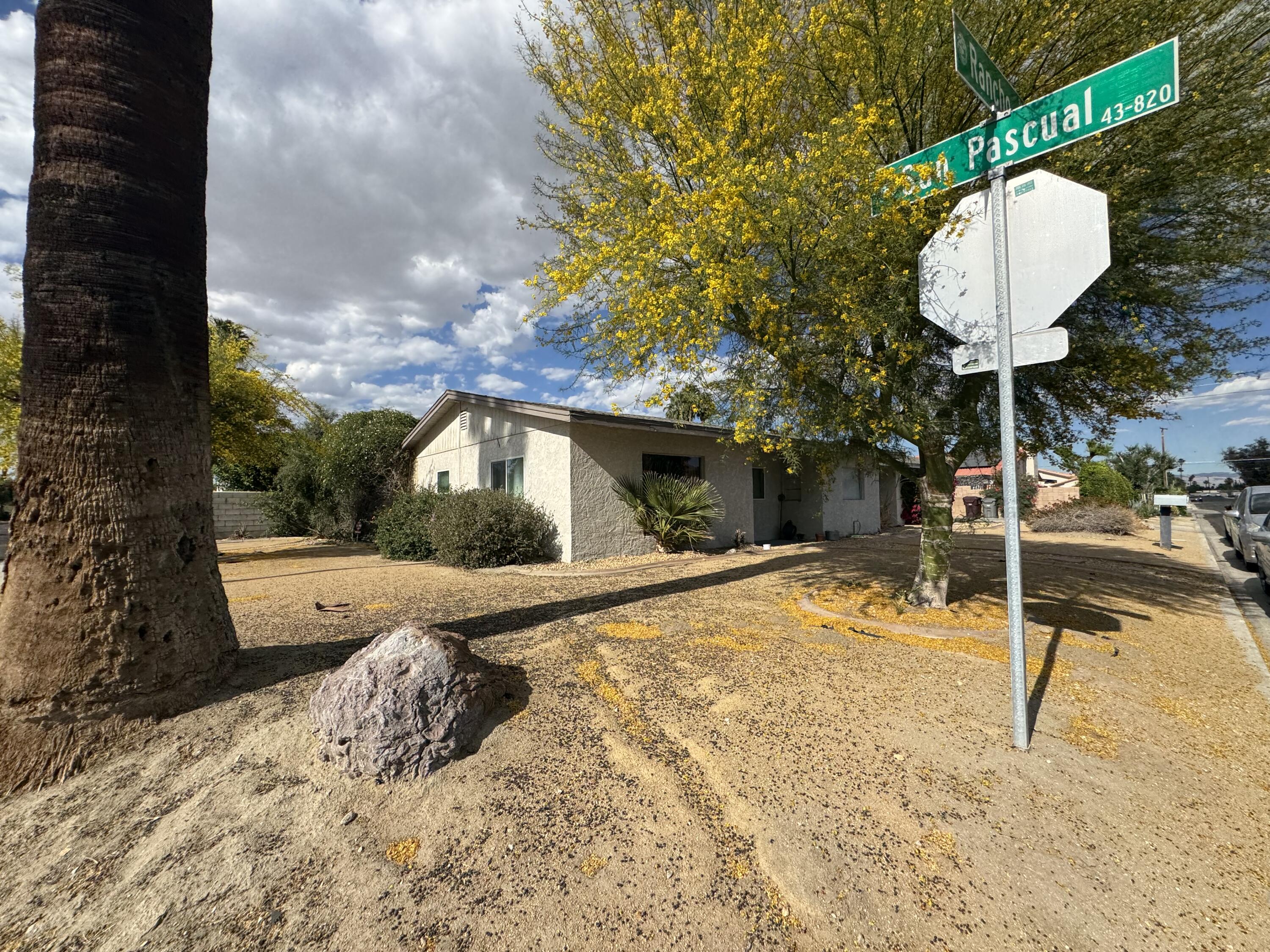 73760 Rancho Road Palm Desert, CA 92260 - Photo 26 of 27 a swimming pool with barbeque oven in front of it
