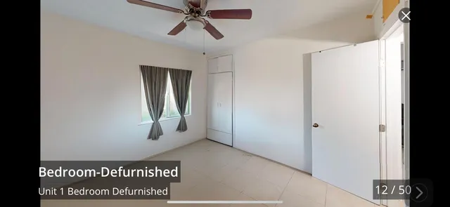 a kitchen with stainless steel appliances a refrigerator sink and cabinets