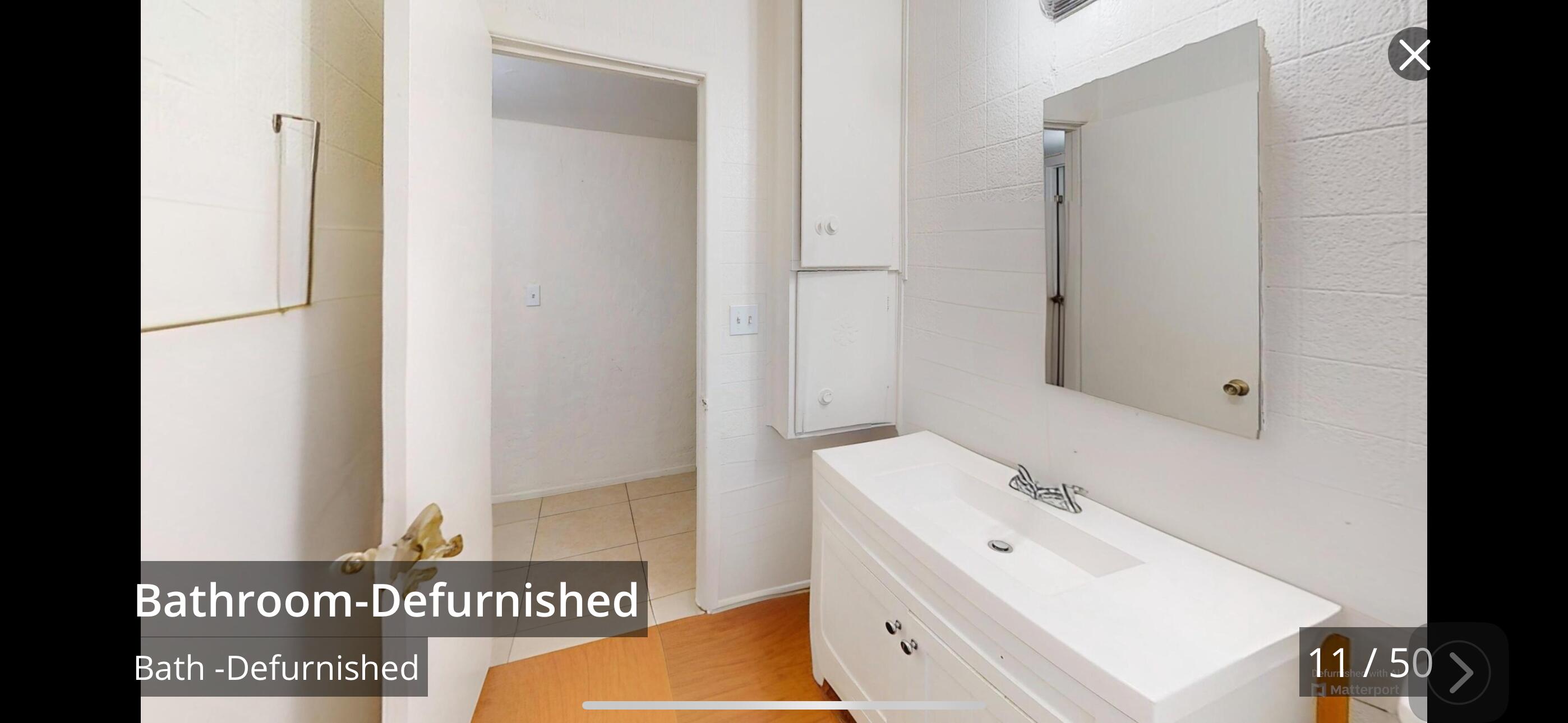 73760 Rancho Road Palm Desert, CA 92260 - Photo 8 of 27 a bathroom with a sink and a mirror