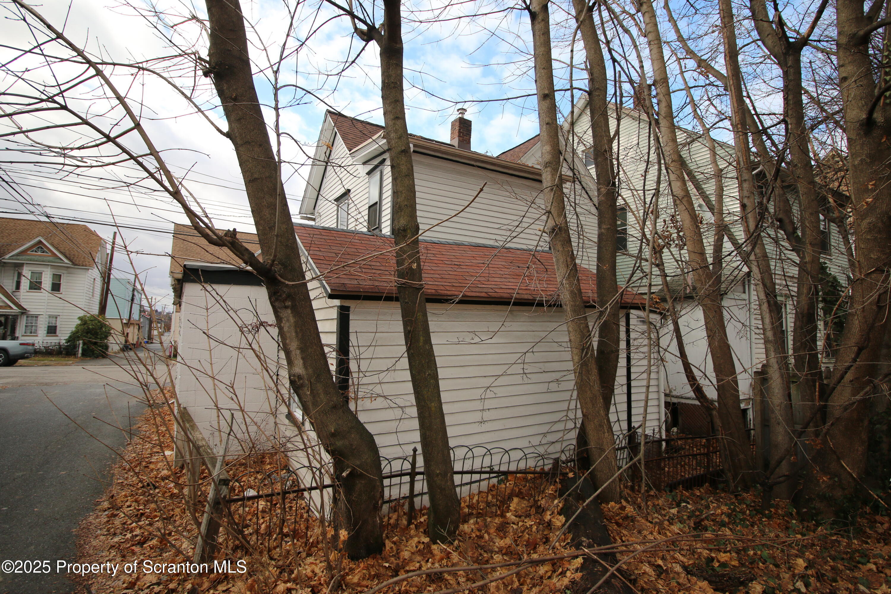 513 Hickory Street Scranton, PA 18505 - Photo 3 of 15 a view of a house with a yard