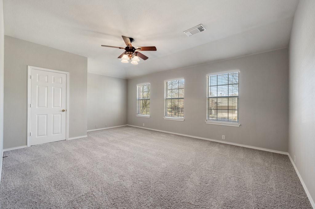 1216 Mathias Street Cedar Park, TX 78613 - Photo 12 of 16 Unfurnished room with light carpet and ceiling fan