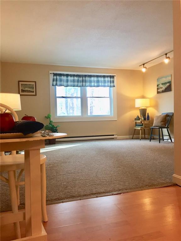 34 Ocean Park Road, Unit 37 Saco, ME 04072 - Photo 11 of 27 Open concept and spacious livingroom.