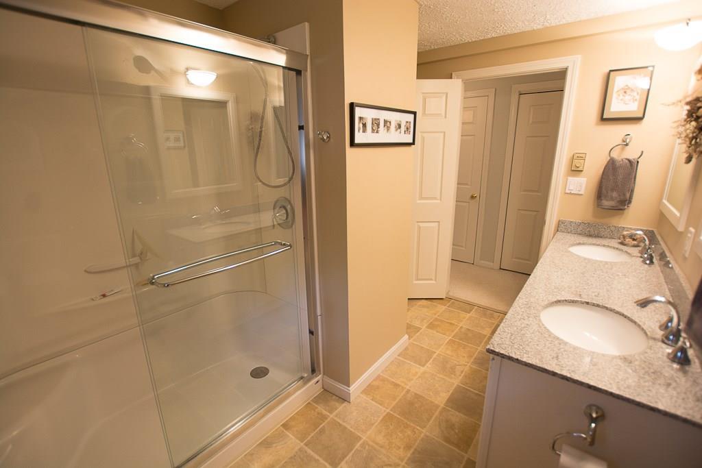 24 Cluf Bay Road, Unit 24 Brunswick, ME 04011 - Photo 13 of 35 An oversized, step-in shower with...