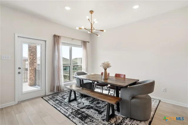 a spacious bedroom with a bed and a large window