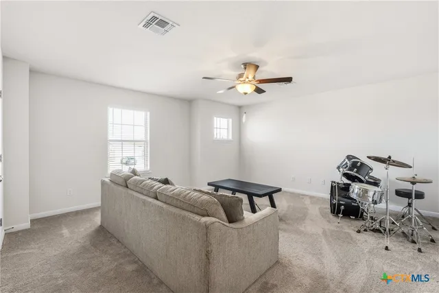 a bedroom with a bed and a closet