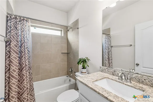 a view of a backyard with a garden