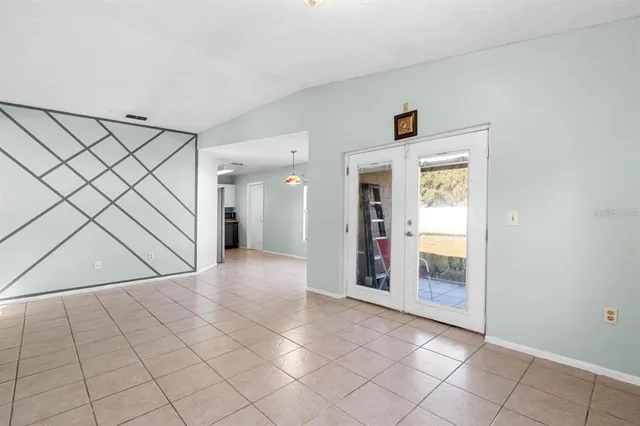 a room with a window and a table