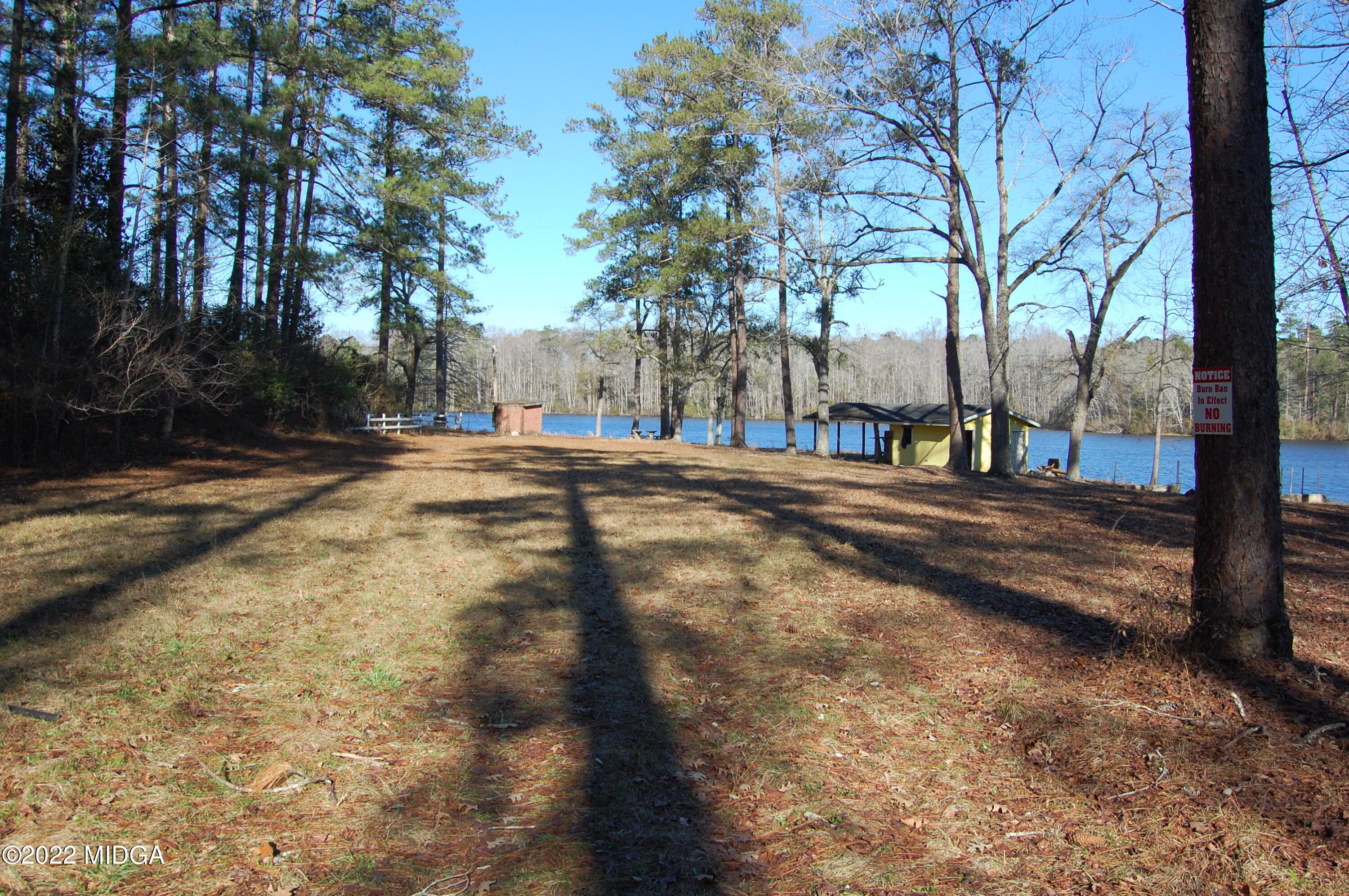 2802 Jeffersonville Road Macon, GA 31217 - Photo 25 of 32 a street view with large trees