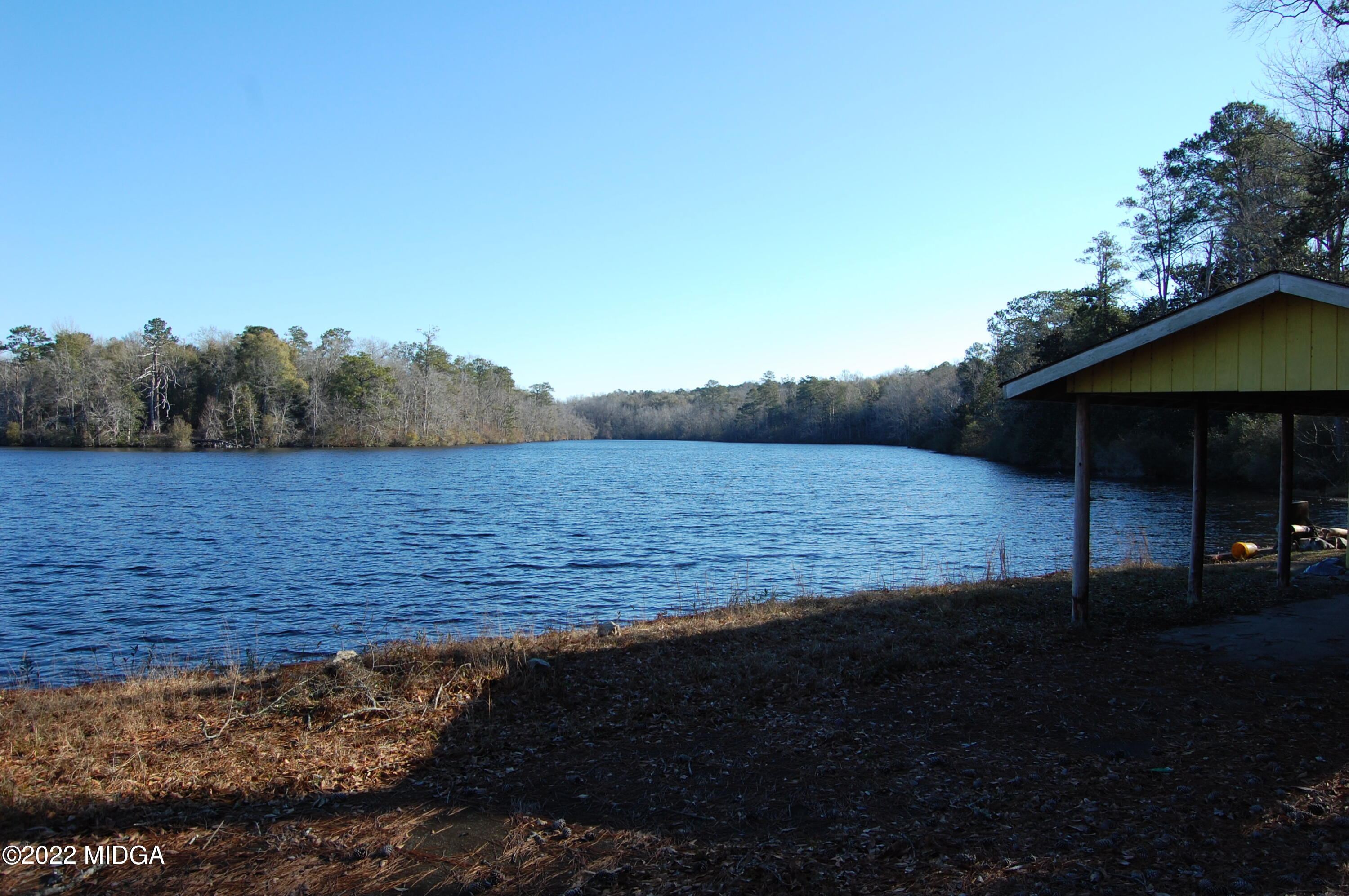 2802 Jeffersonville Road Macon, GA 31217 - Photo 3 of 32 a view of a lake with a mountain in the background