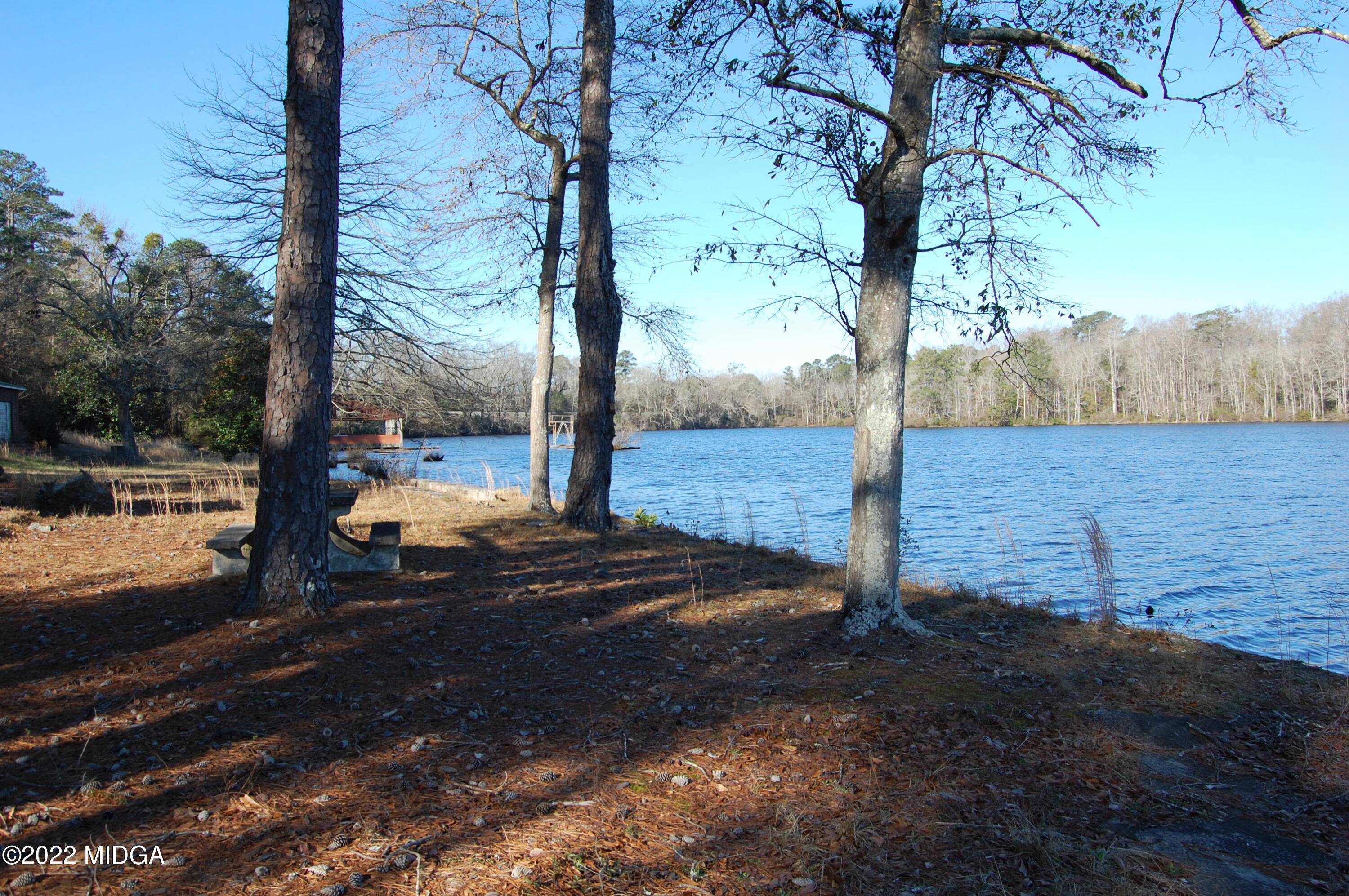 2802 Jeffersonville Road Macon, GA 31217 - Photo 5 of 32 a view of a yard with wooden fence