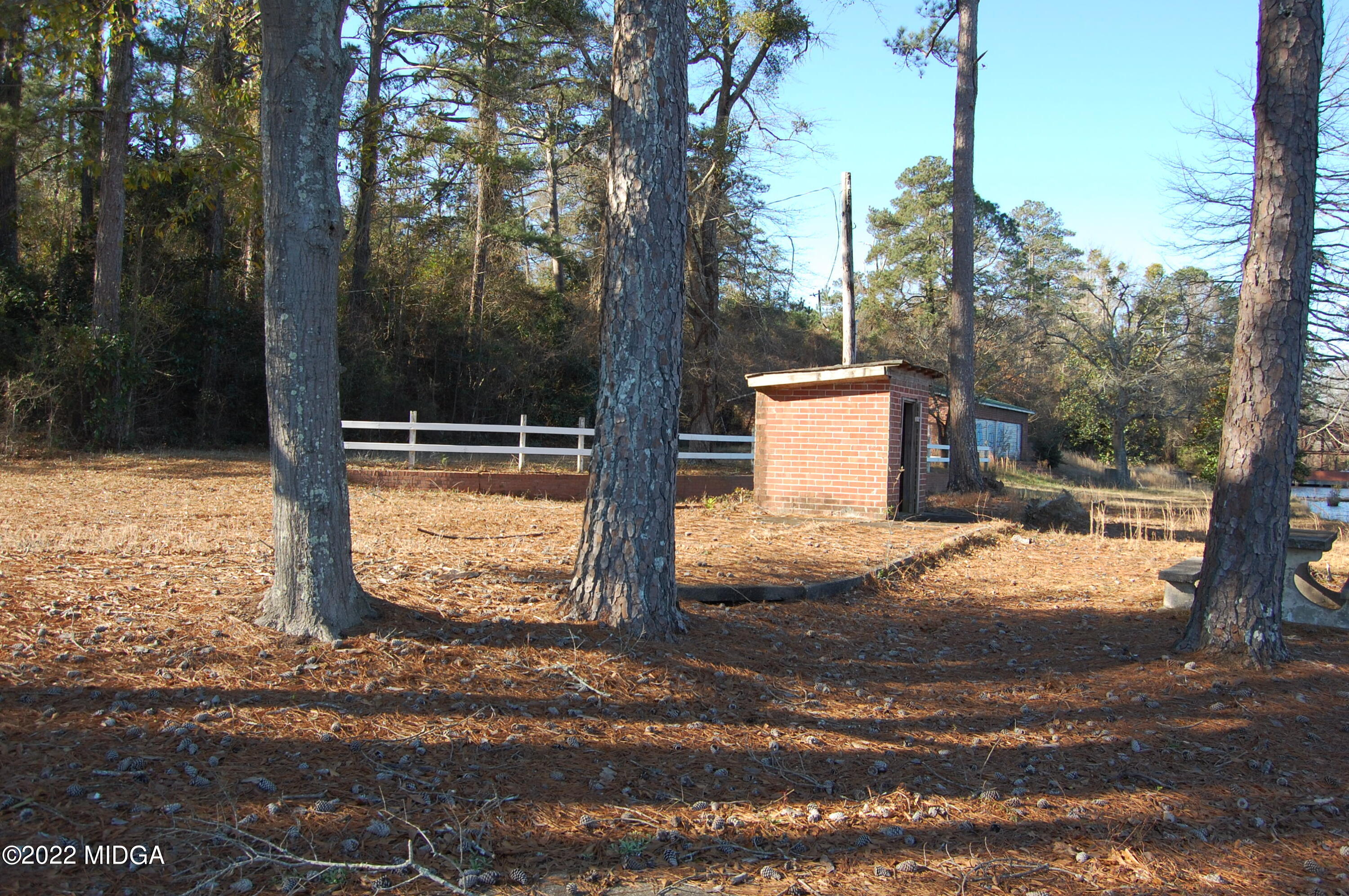 2802 Jeffersonville Road Macon, GA 31217 - Photo 9 of 32 a view of a yard with tree s