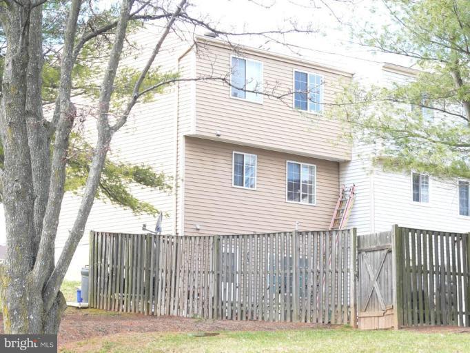 1417 Farmcrest Way Silver Spring, MD 20905 - Photo 3 of 18 Fenced yard and rear view of home