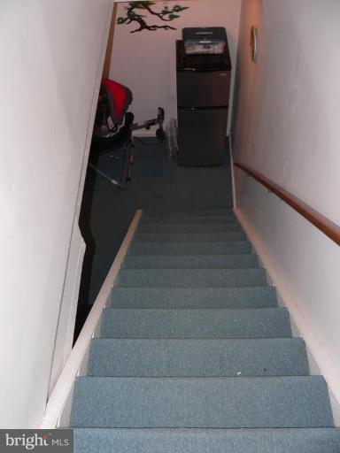 1417 Farmcrest Way Silver Spring, MD 20905 - Photo 8 of 18 stairs down to fully finished basement