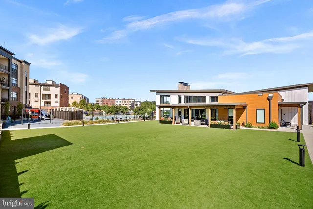 a balcony with furniture and garden