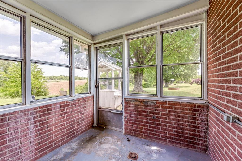 1090 Watt Stevens Road Danbury, NC 27016 - Photo 31 of 49 Sunroom
