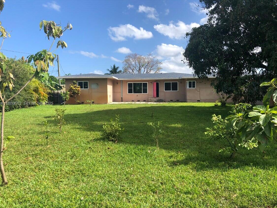 2815 Jackson Street Hollywood, FL 33020 - Photo 5 of 7 a view of a house with a backyard