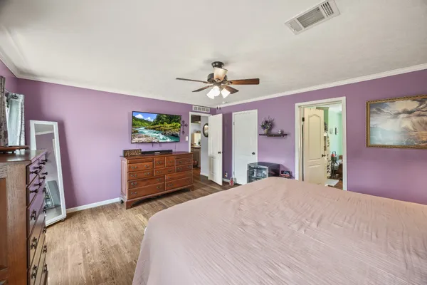 a bathroom with a sink mirror and a bathtub