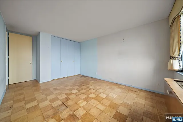 a view of living room and kitchen