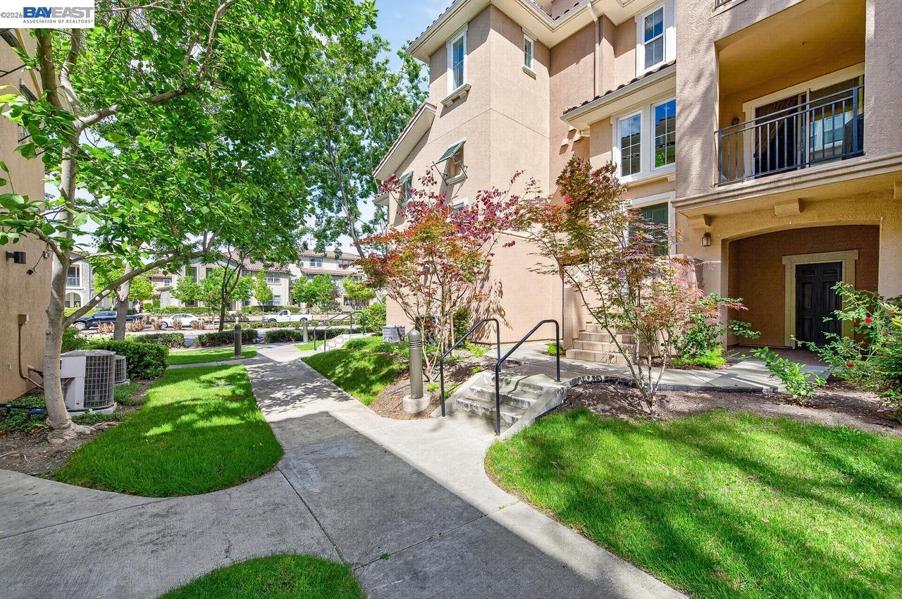 3391 Monaghan Street Dublin, CA 94568 - Photo 3 of 57 a building view with a garden space