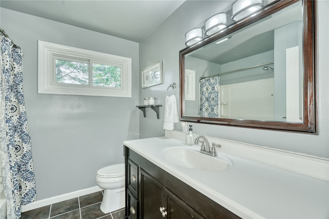 1038 Whalen Road Penfield, NY 14526 - Photo 28 of 46 Main bathroom, updated! Newer, vanity, mirror, lig