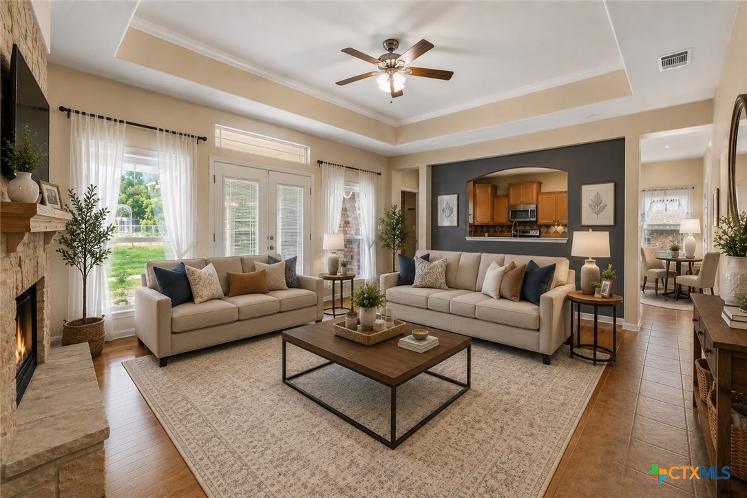 283 County Road 4710 Kempner, TX 76539 - Photo 5 of 47 a living room with furniture flat screen tv and a fireplace