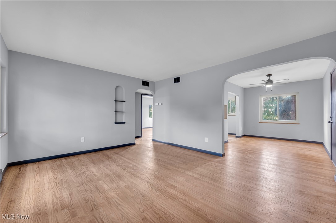 5235 State Road, Unit 3 Cleveland, OH 44134 - Photo 9 of 21 Unfurnished living room featuring ceiling fan and light wood-type flooring