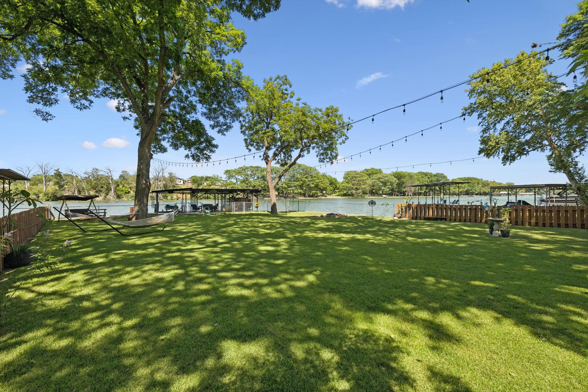 1435 East Zipp Road New Braunfels, TX 78130 - Photo 40 of 43 a view of outdoor space with garden and trees