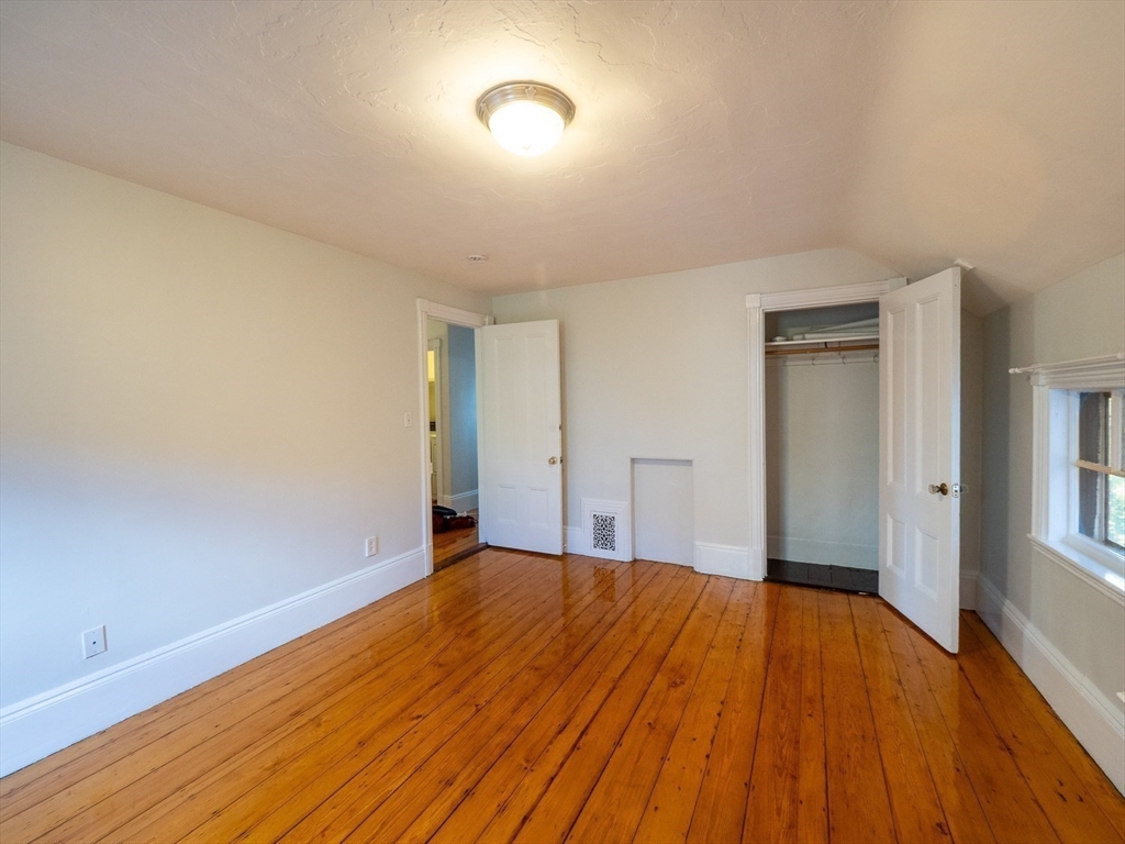 12 Adella Place Boston, MA 02134 - Photo 20 of 36 a view of a room with wooden floor and bathroom