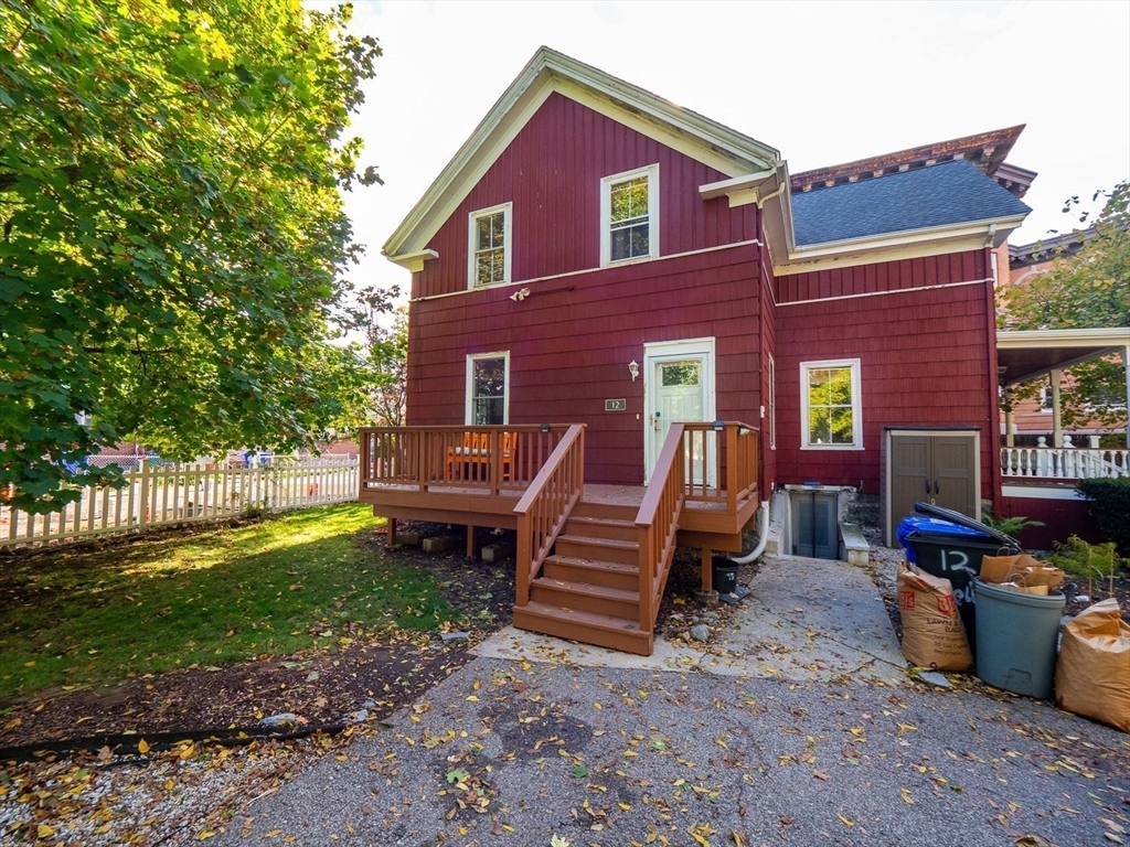 12 Adella Place Boston, MA 02134 - Photo 35 of 36 a view of a house with a yard and a patio