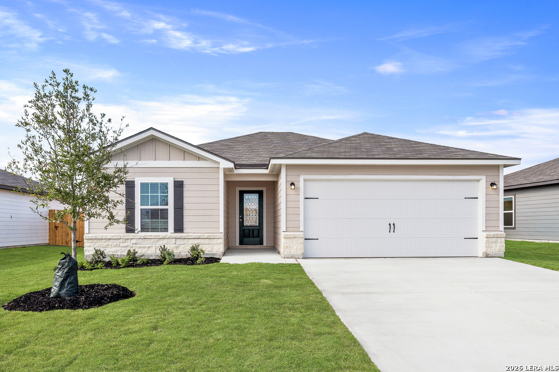 16189 Farmer Lytle, TX 78052 - Photo 1 of 28 a view of a house with a garden
