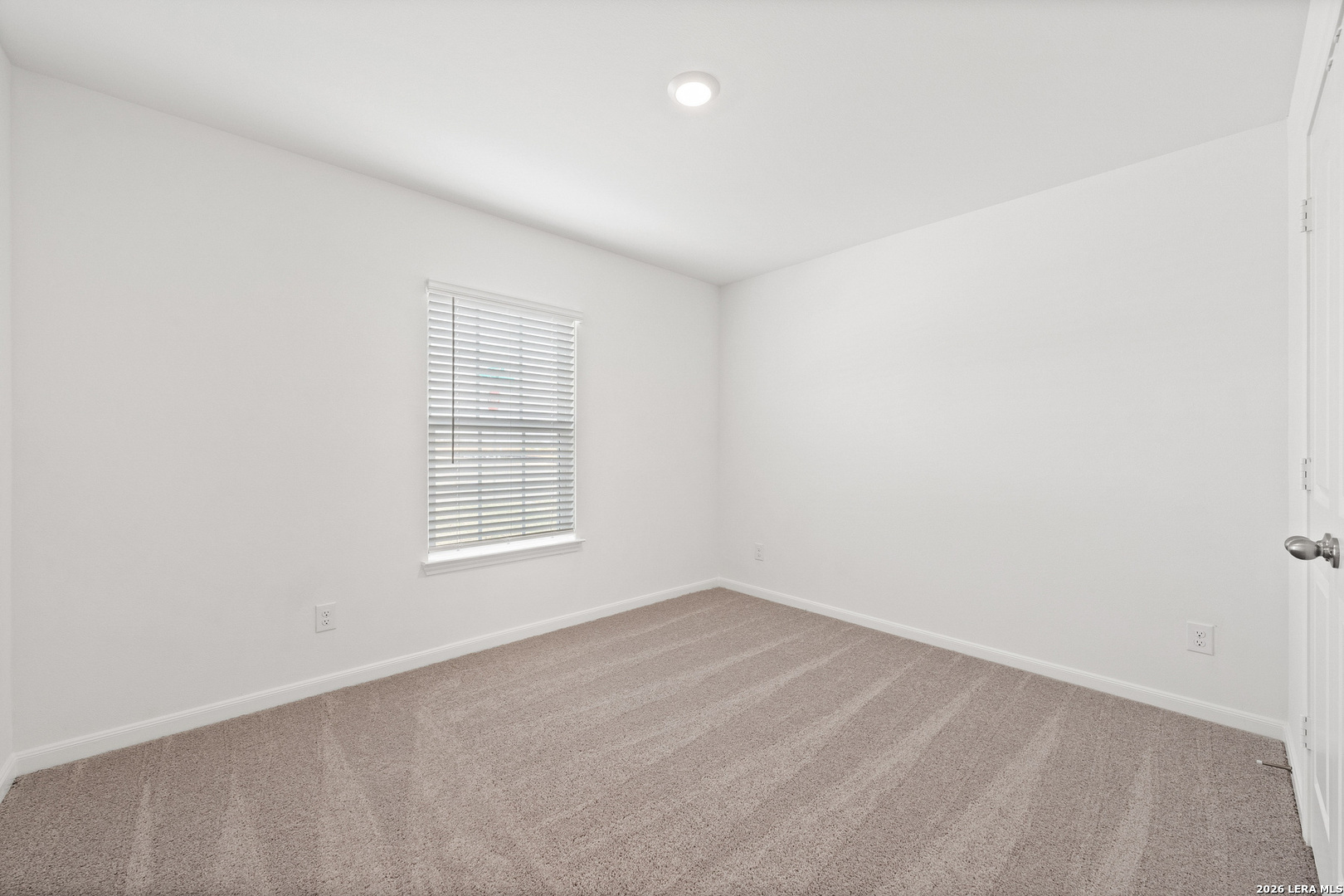 16189 Farmer Lytle, TX 78052 - Photo 16 of 28 an empty room with a window
