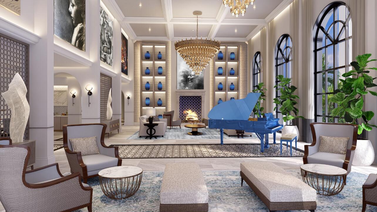 5400 Broken Sound Boulevard Northwest, Unit 201 Boca Raton, FL 33487 - Photo 9 of 10 a living room with furniture a chandelier and a fireplace