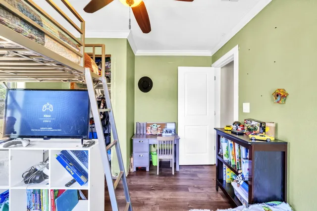 a bed room with furniture and a window