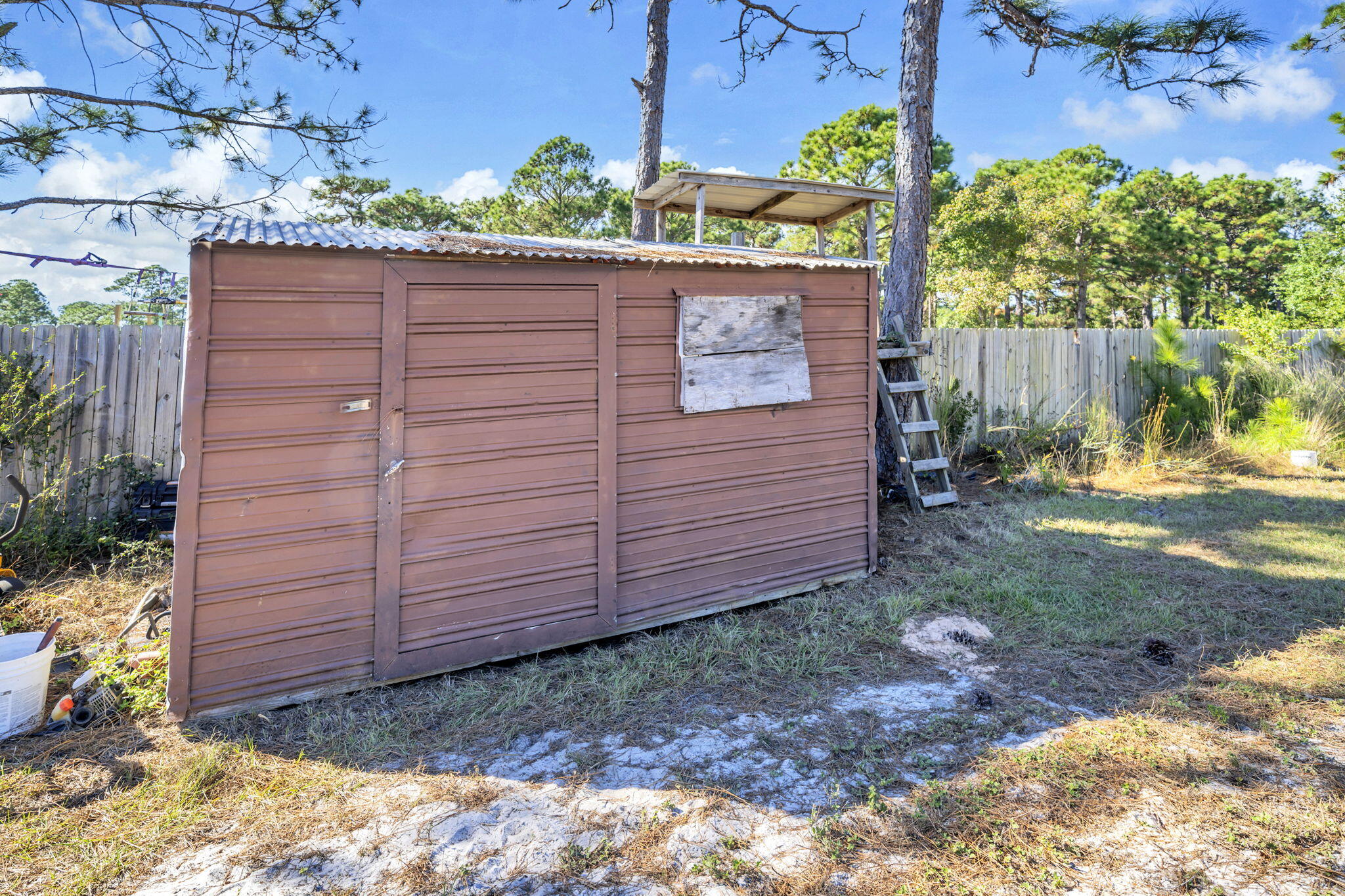 9276 Ridge Road Navarre, FL 32566 - Photo 36 of 39 Storage shed & tree house