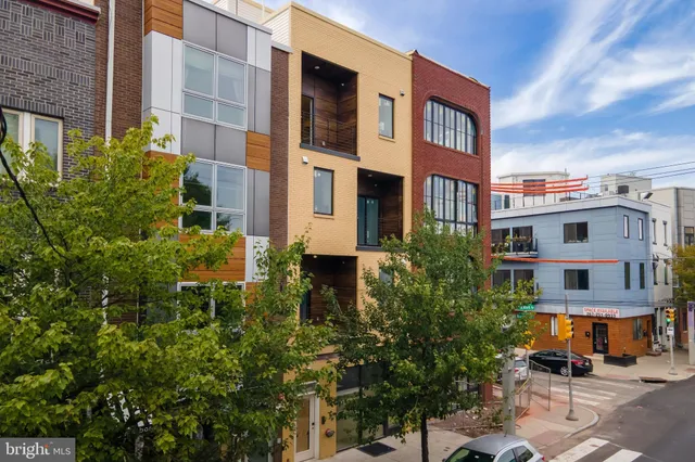 a front view of a multi story residential apartment building