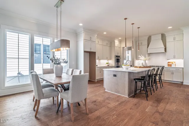 a bathroom with a shower sink and mirror