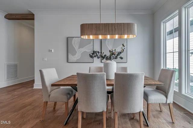 a white toilet sitting next to a bath tub