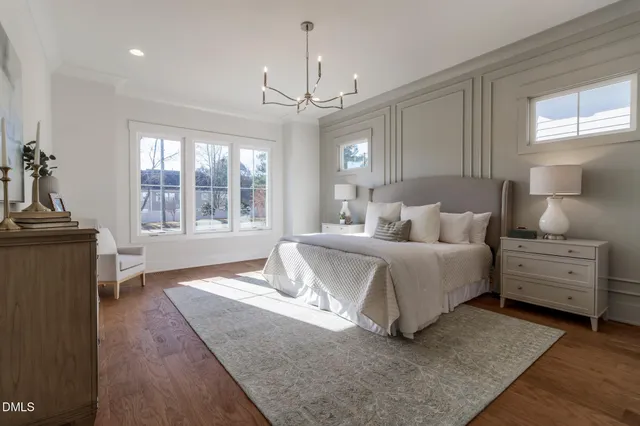 a view of an empty room with closet and cabinet