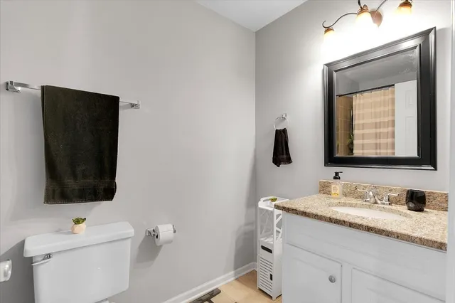 a view of a backyard with sitting area