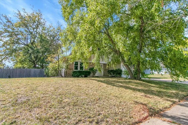 a view of a bench in a garden