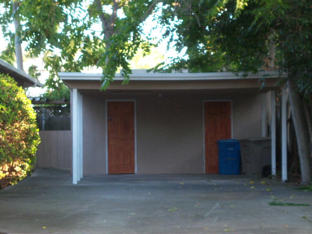 10237 University Way Cupertino, CA 95014 - Photo 3 of 12 a house with a tree in front of it