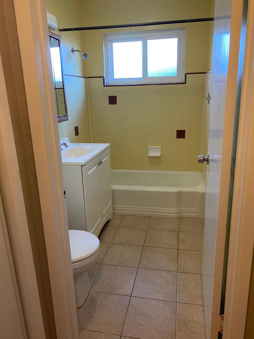 10237 University Way Cupertino, CA 95014 - Photo 6 of 12 a bathroom with a sink a toilet and shower