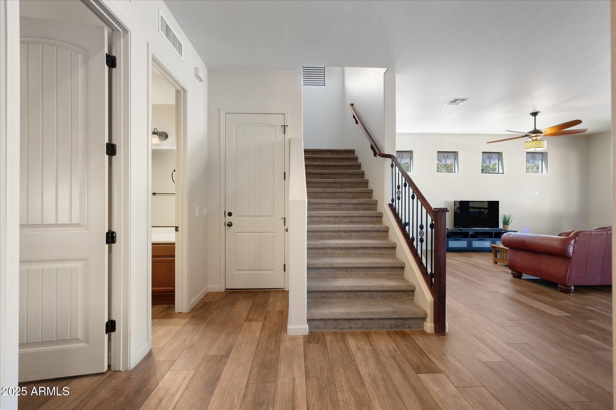 8536 East Inca Street Mesa, AZ 85207 - Photo 6 of 44 a view of entryway and hall with wooden floor