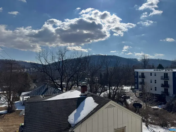 a view of a couches on the roof deck