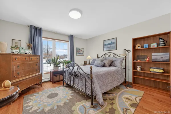 a bed room with a bed and a window