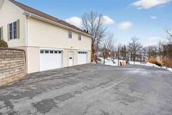 a view of a backyard of the house