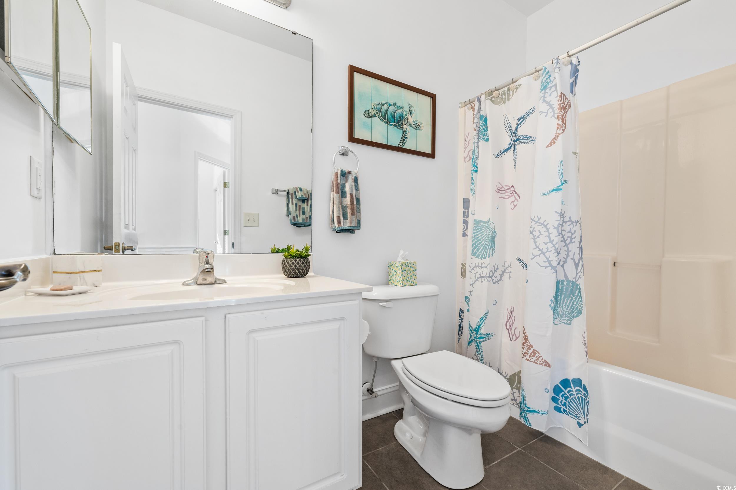 673 Botany Loop, Unit 673 Murrells Inlet, SC 29576 - Photo 12 of 39 Full bathroom featuring toilet, shower / bath comb
